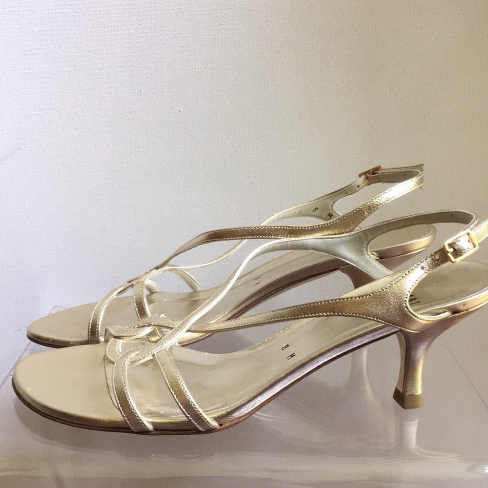 Stuart Weitzman gold sandals. Delicate straps, curved 2 1/2" heels. 8M. EUC.